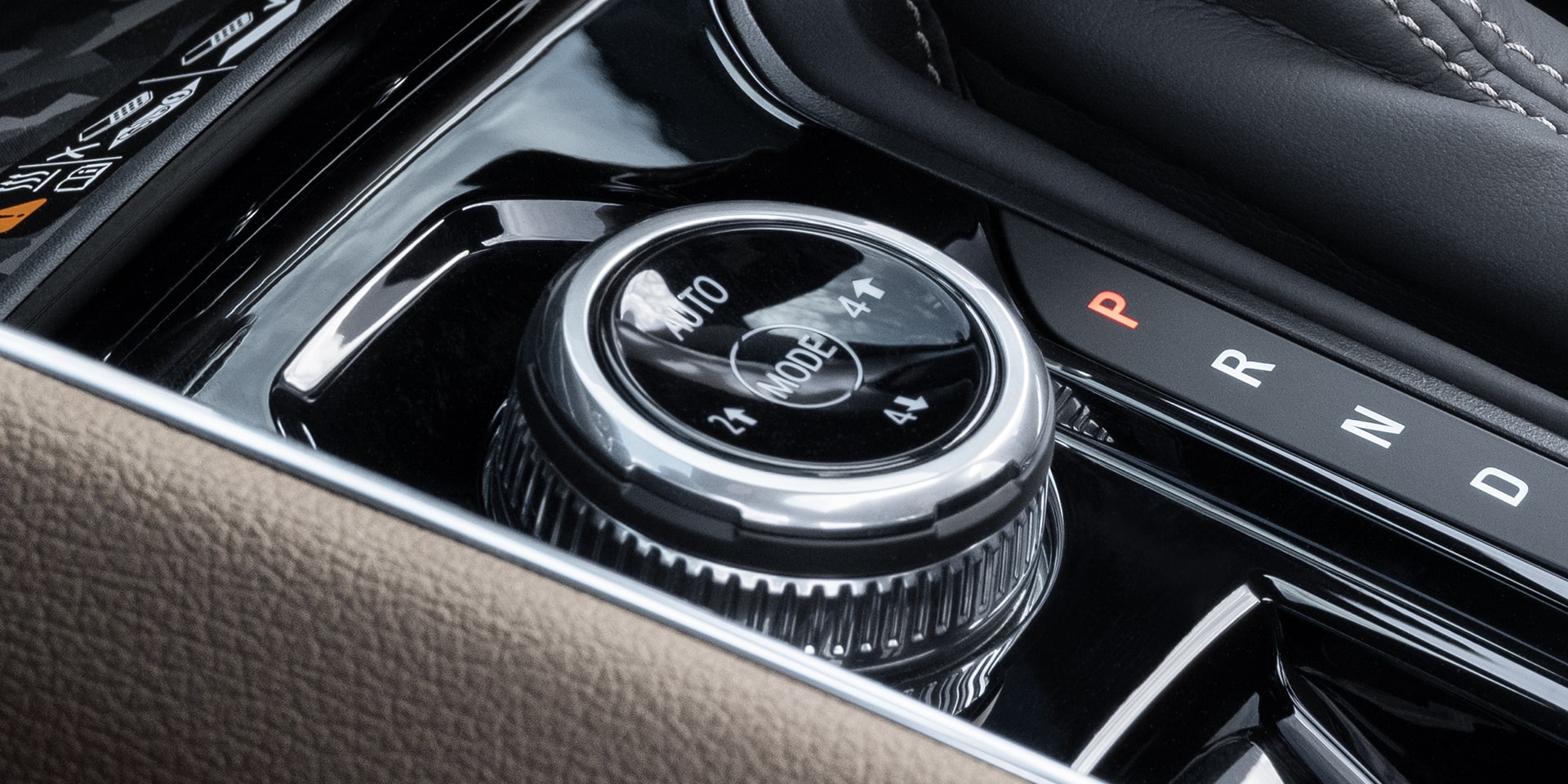 Vue rapprochée du bouton de modes de conduite du GMC Canyon Denali 2026.