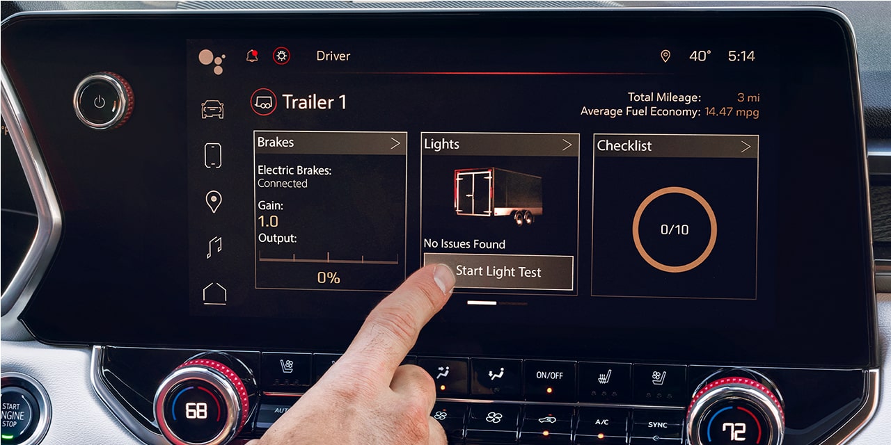 Des renseignements sur le remorquage sont affichés sur l’écran du système d’infodivertissement du GMC Canyon Denali 2026.