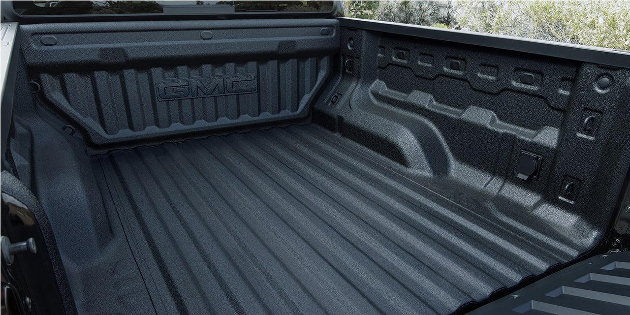 Vue rapprochée de la caisse polyvalente du GMC Canyon Denali 2026.