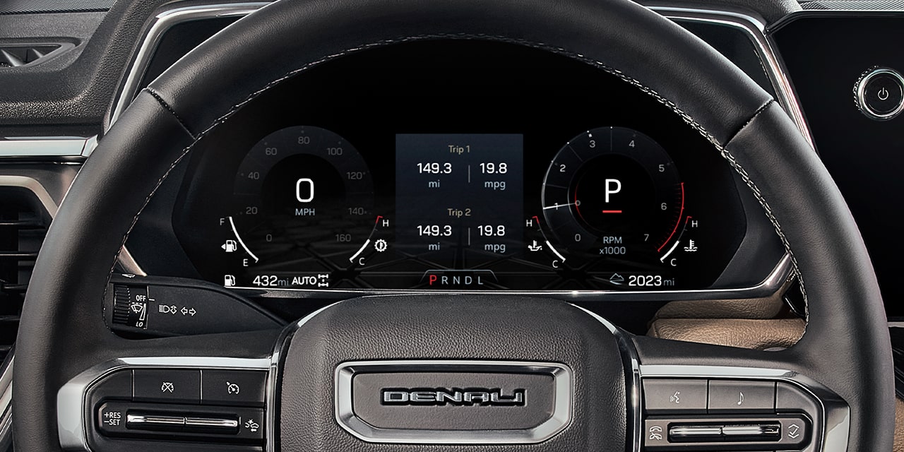 Vue rapprochée du centralisateur informatique de bord du GMC Canyon Denali 2026.