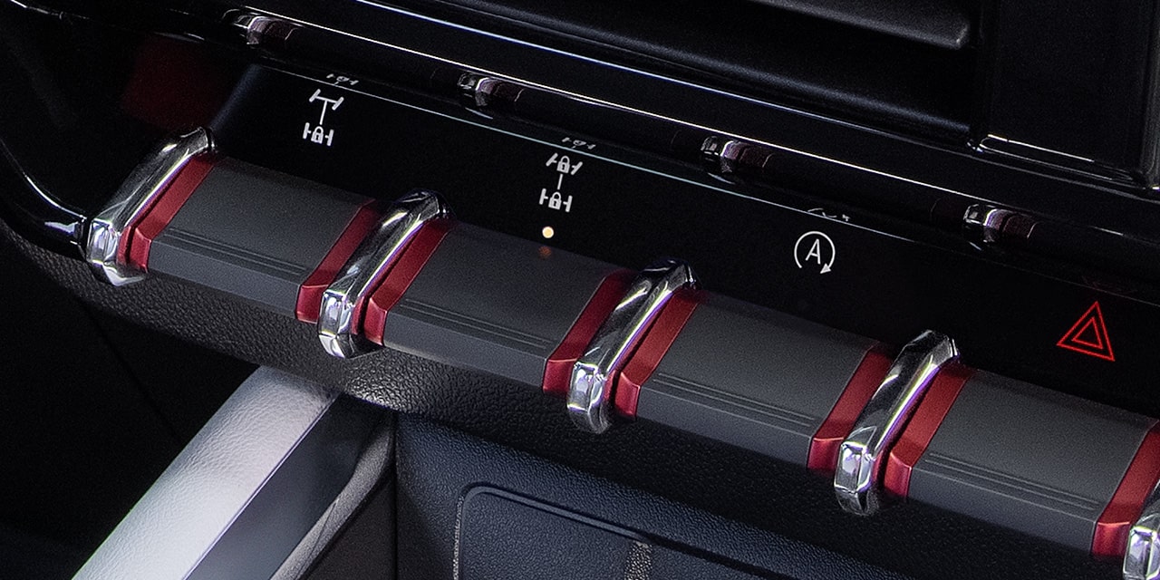 Close-up view of the off-road switches inside the 2026 GMC Canyon.
