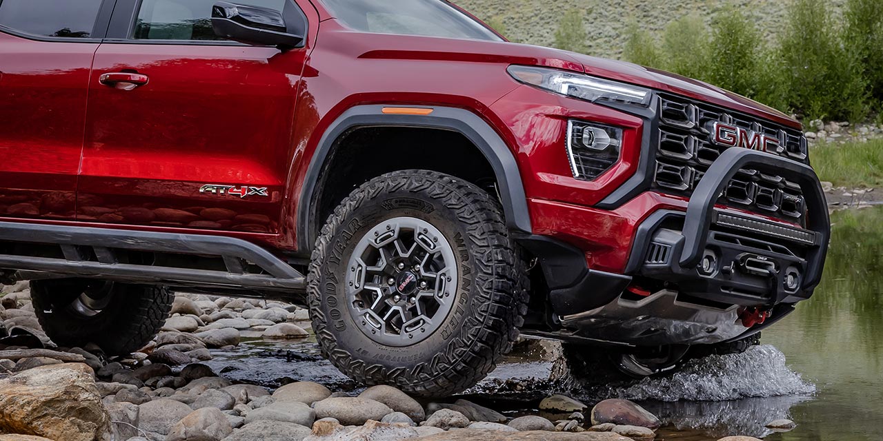 Side view of the front exteriors of the 2026 GMC Canyon.