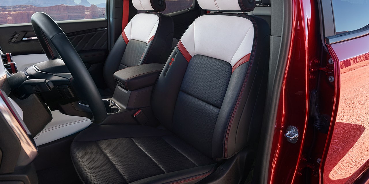 Close-up view of the Power Drive Seat inside the 2026 GMC Canyon.