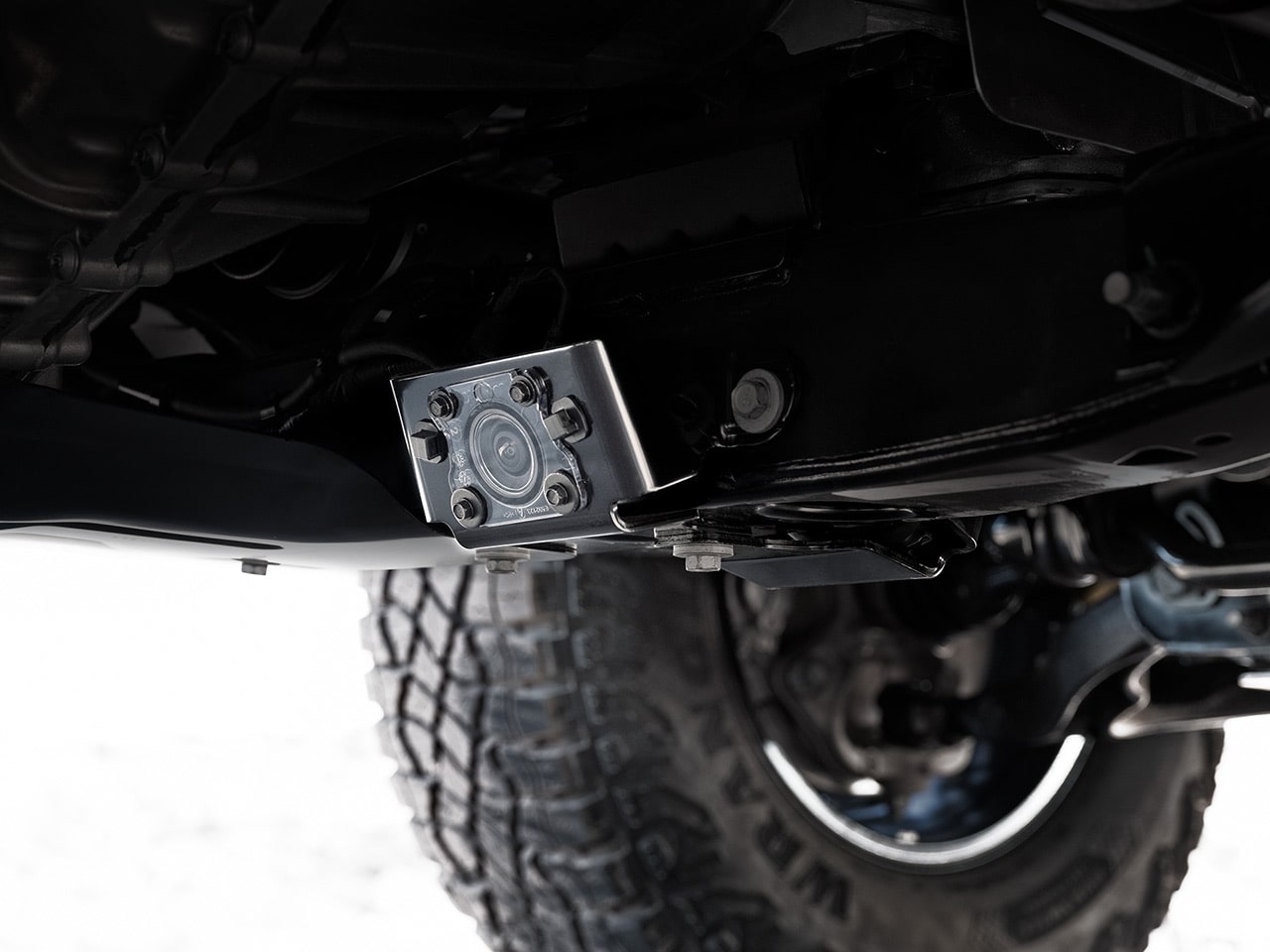Close-up view of a camera attached to the underbody of the 2026 GMC Canyon.
