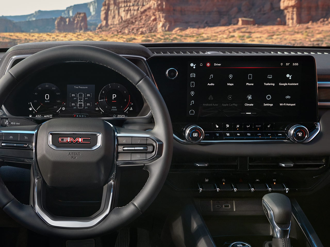 Driver's view of the Steering Wheel and Infotainment Screen inside the 2026 GMC Canyon.