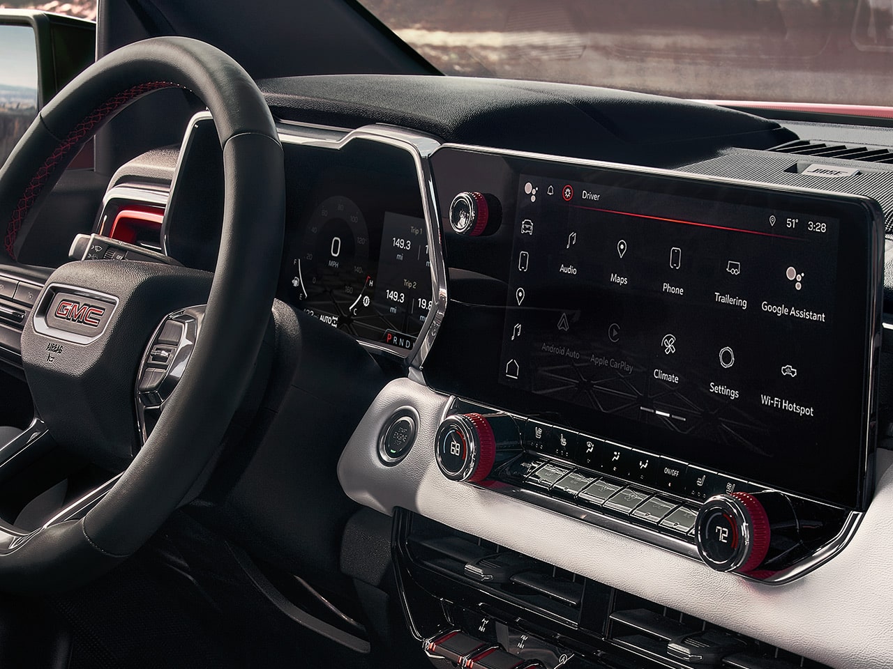 Steering wheel and infotainment screen inside the 2026 GMC Canyon.