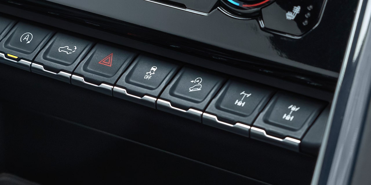Close-up of the Hill Descent Controls of the 2026 GMC Sierra 1500 AT4.