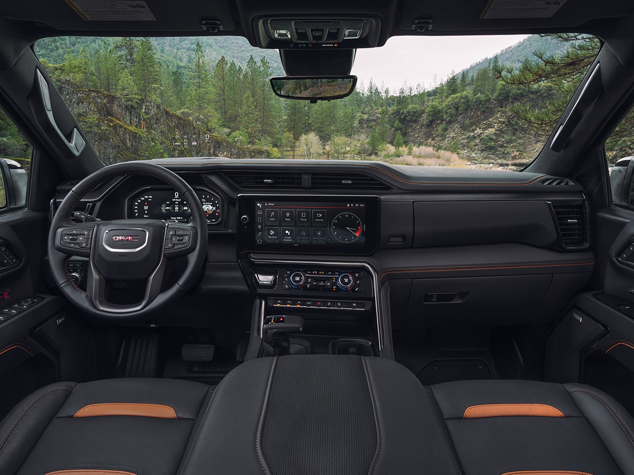 Interior View of the Dashboard and Infotainment System in the 2026 Sierra 1500 AT4.