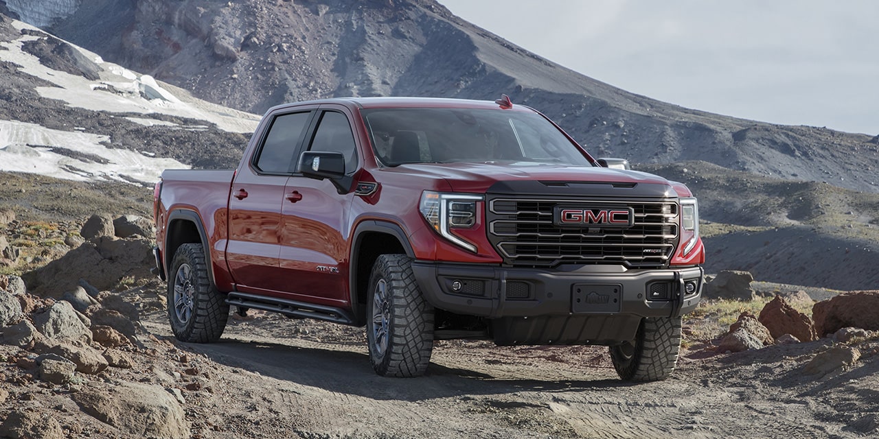 The 2026 GMC Sierra 1500 AT4 Off-Road Parked alone on Rocky Terrain.