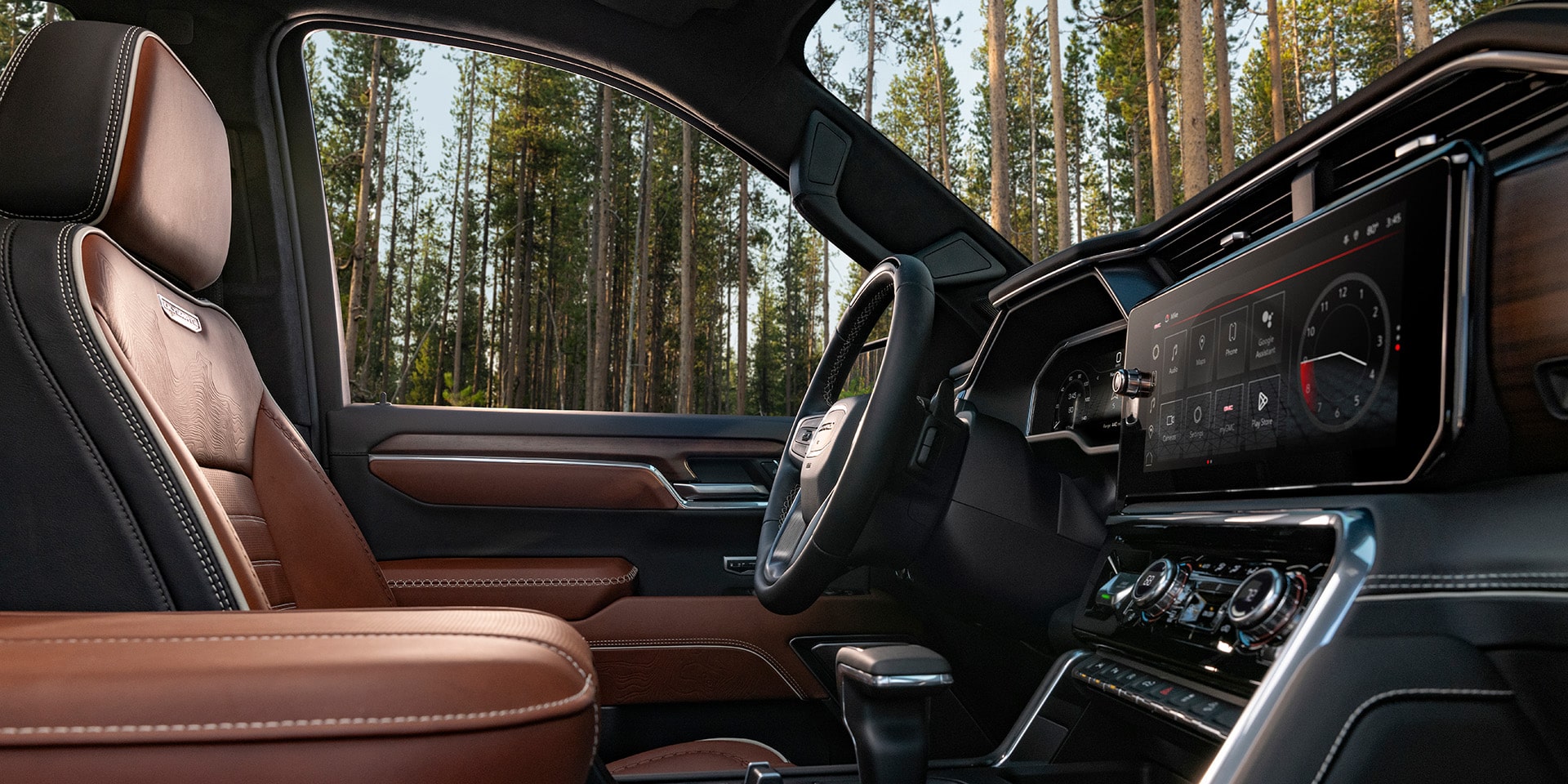 Interior View From the Passenger Side of the Front Row Seating in the 2026 GMC Sierra 1500.