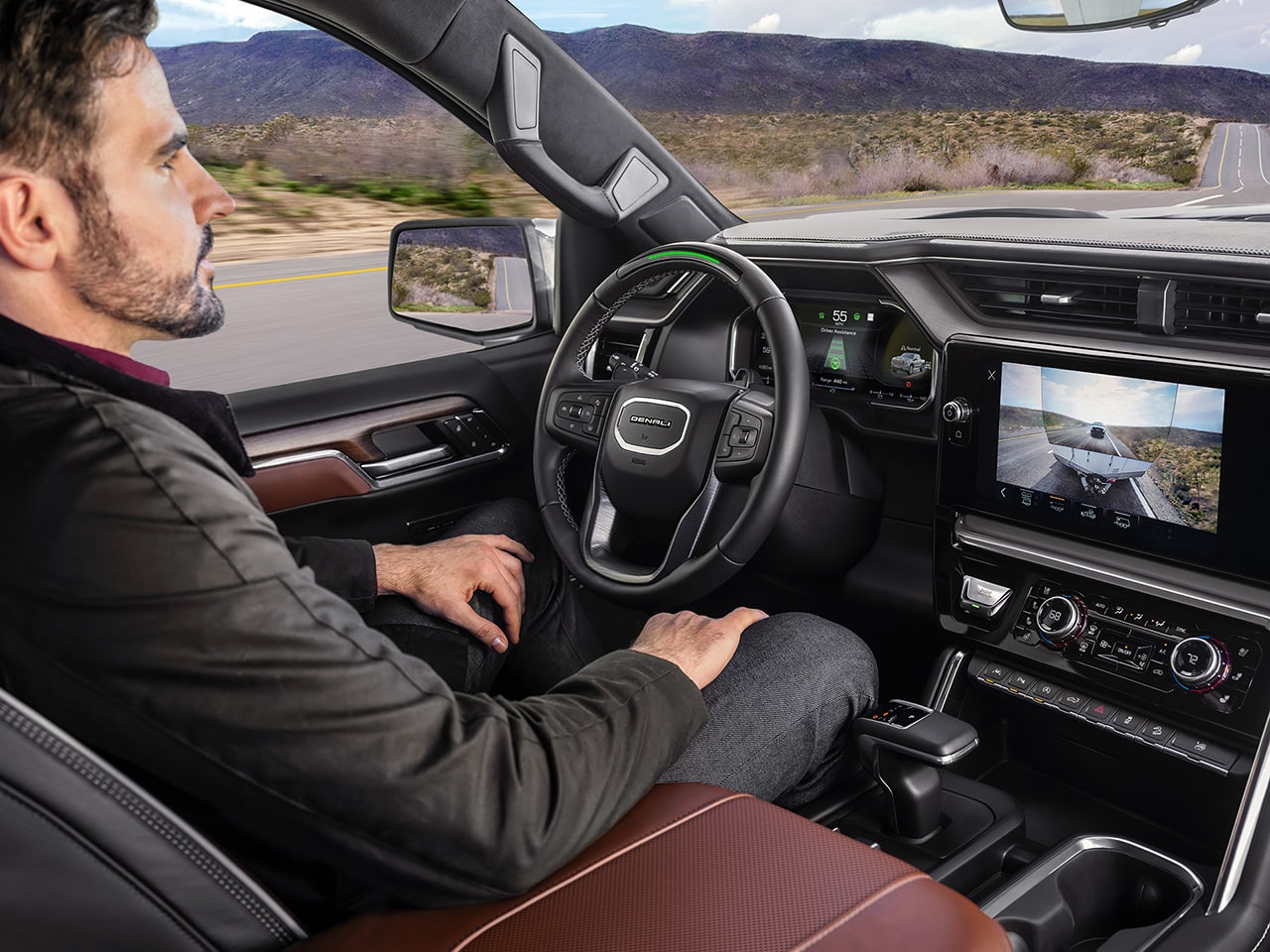 A Driver utilizing the Super Cruise Feature of the 2026 GMC Sierra 1500 Pickup Truck.
