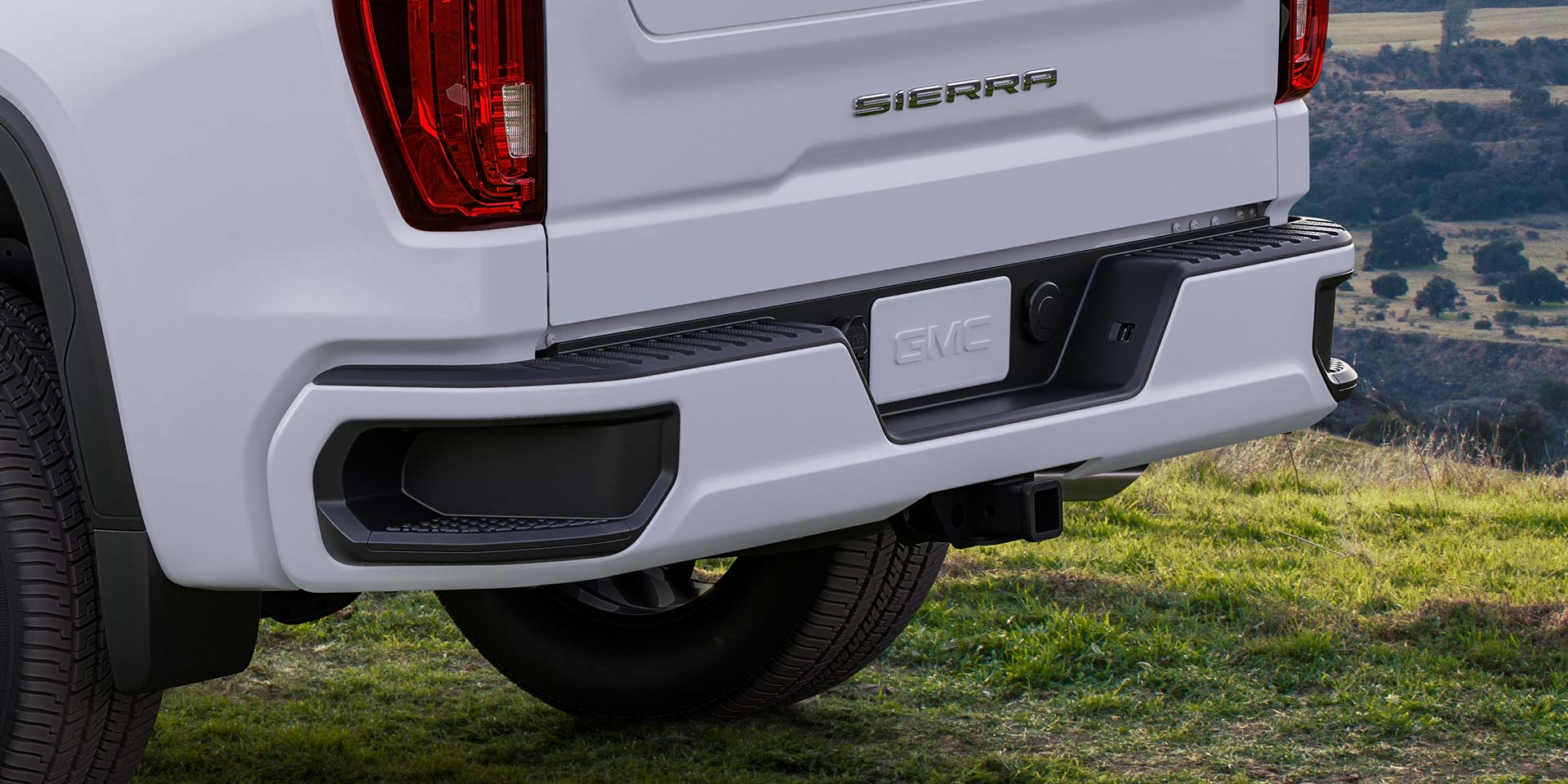Close-up of the Premium Rear Bumper of the 2026 GMC Sierra 1500 Pro.
