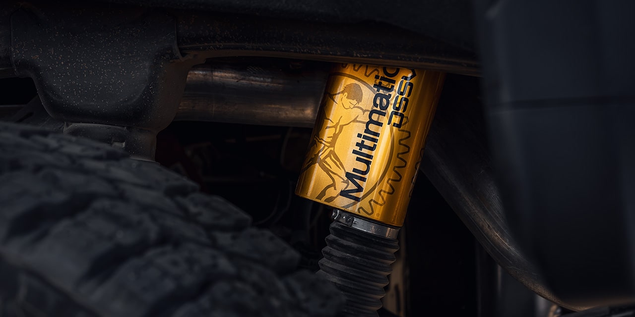 Close-up of Multimatic DSSV Dampers on the 2026 GMC Sierra HD AT4.