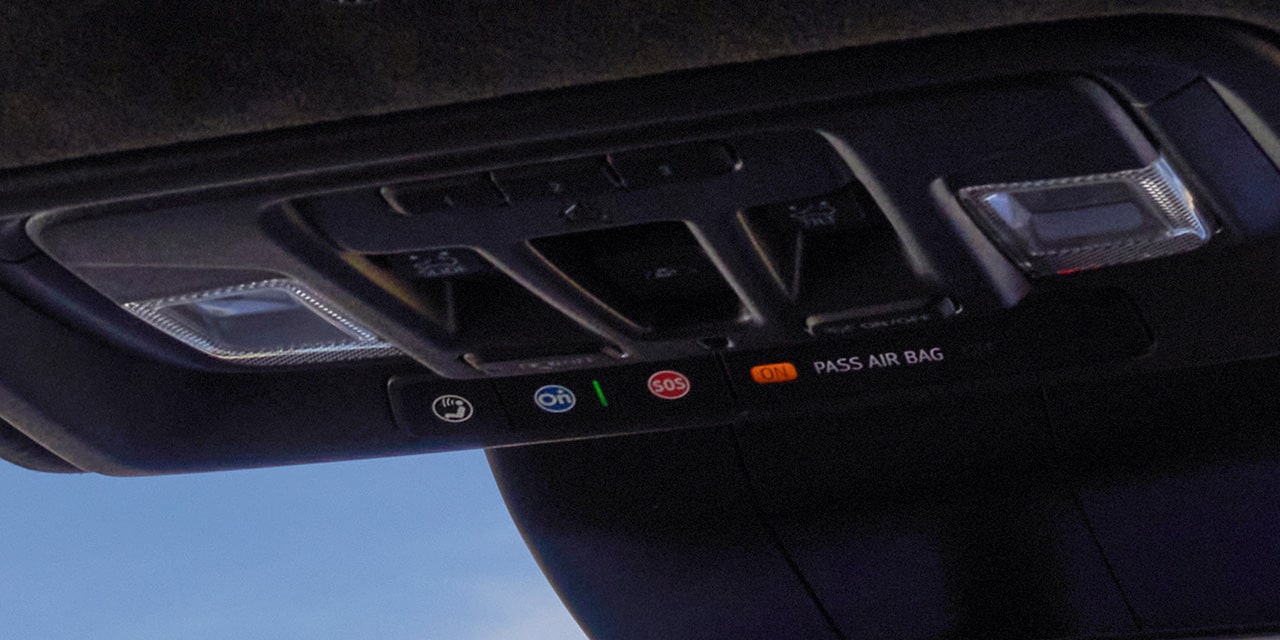 Close-up of the OnStar Basics Button inside the 2026 GMC Sierra HD AT4.