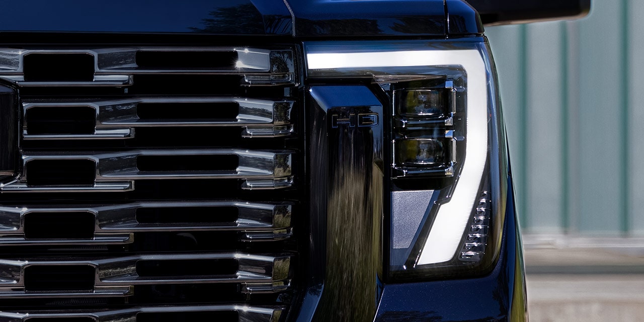 Close-up View of the LED Headlamps on the 2026 GMC Sierra Denali Luxury Truck.