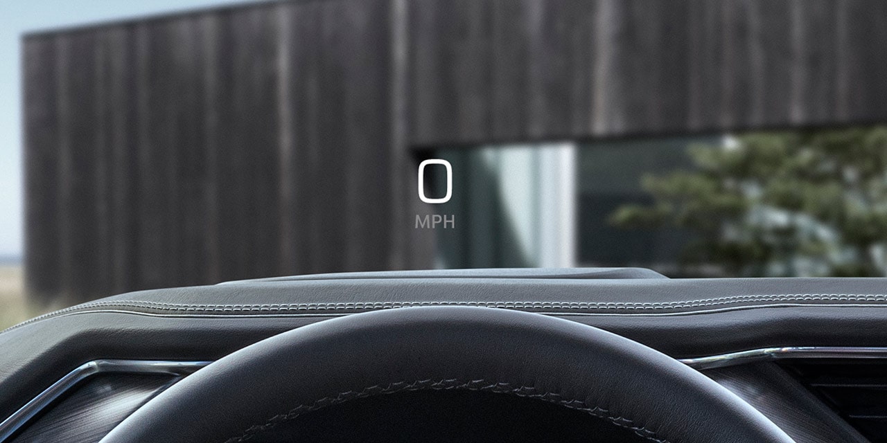 Close-up View of the Heads Up Display Feature in Use in a 2026 GMC Sierra HD Denali Luxury Truck.