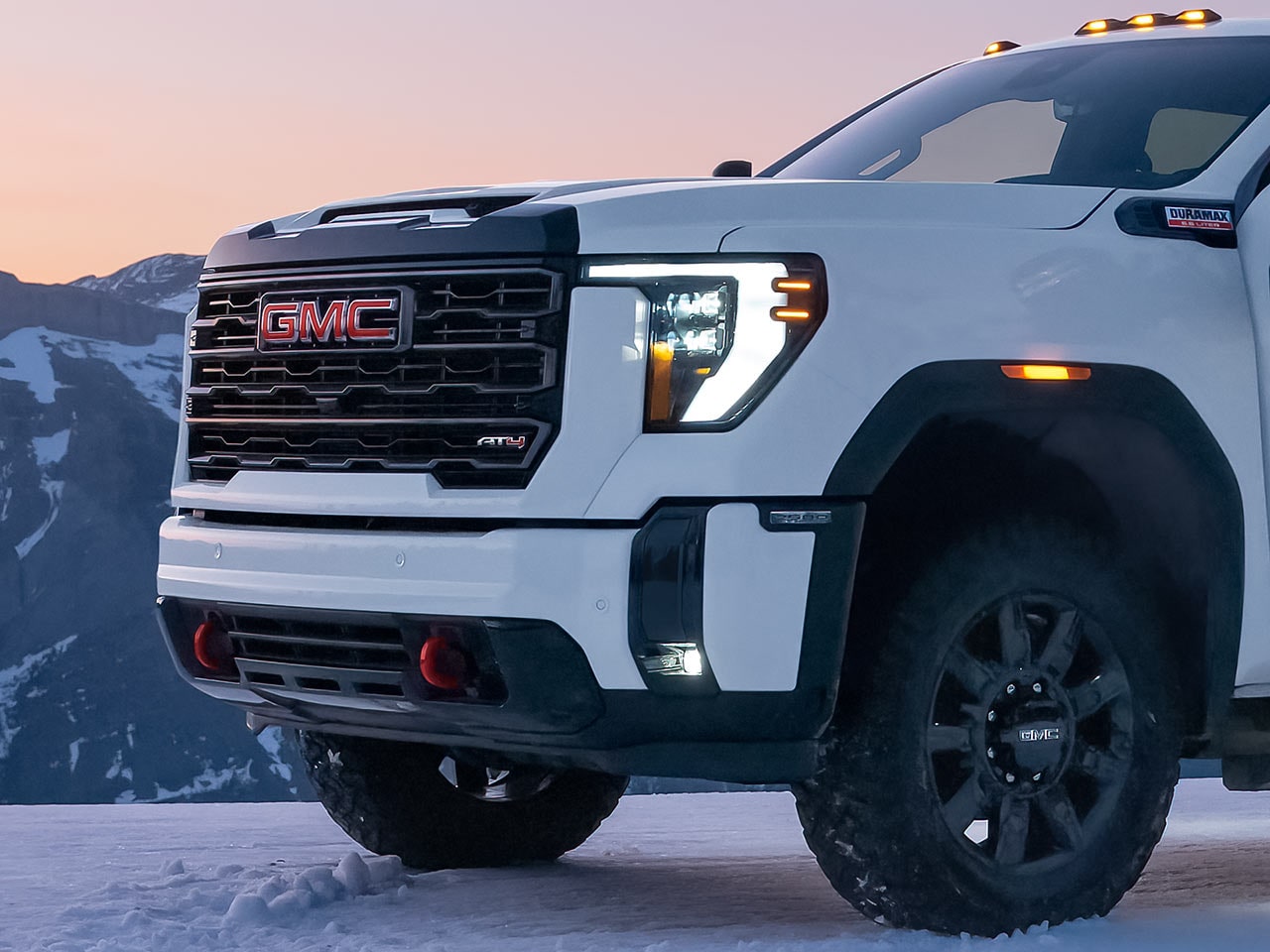 Close-up View of the 2026 GMC Sierra HD Exterior LED Headlamps.