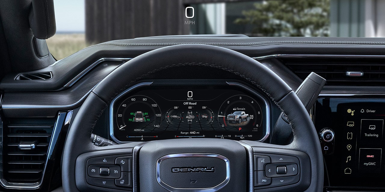 Driver's View of the 2026 GMC Sierra HD Denali Steering Wheel and Driver Information Center.