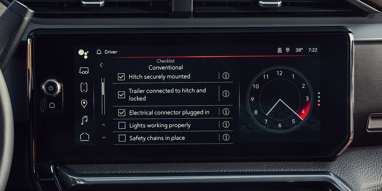 Close-up of the Infotainment Screen in the 2026 GMC Sierra HD Pro Truck Displaying the Prograde Trailering Tech.