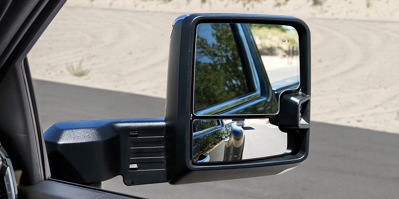 Close-up View of the Trailering Mirrors on the 2026 GMC Sierra HD Pro Truck.