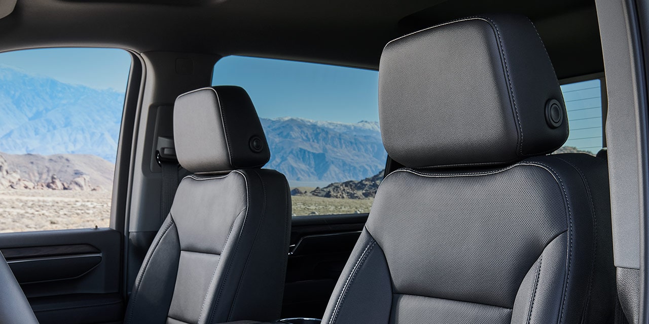 Interior View of the Premium Front Seats of the 2026 GMC Sierra HD Pro Truck.