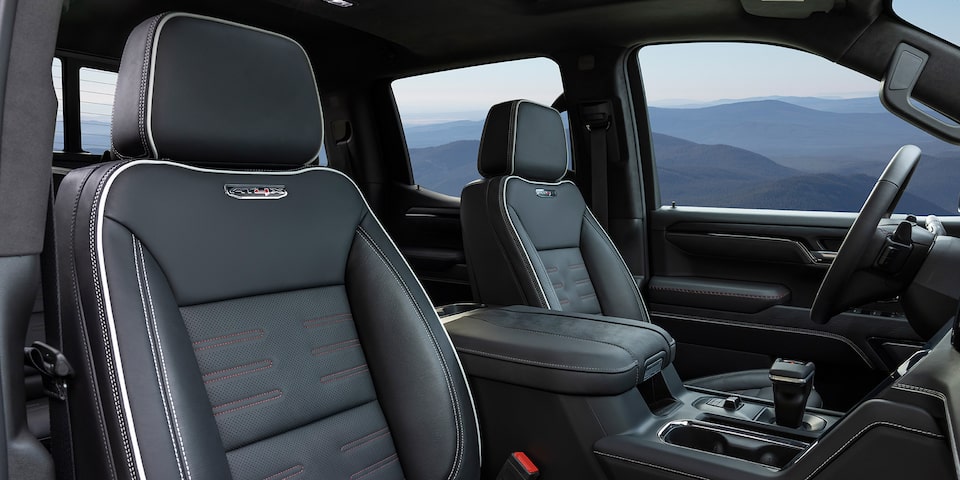 Premium leather-trimmed door panels  of the 2024 GMC Sierra 1500 AT4.