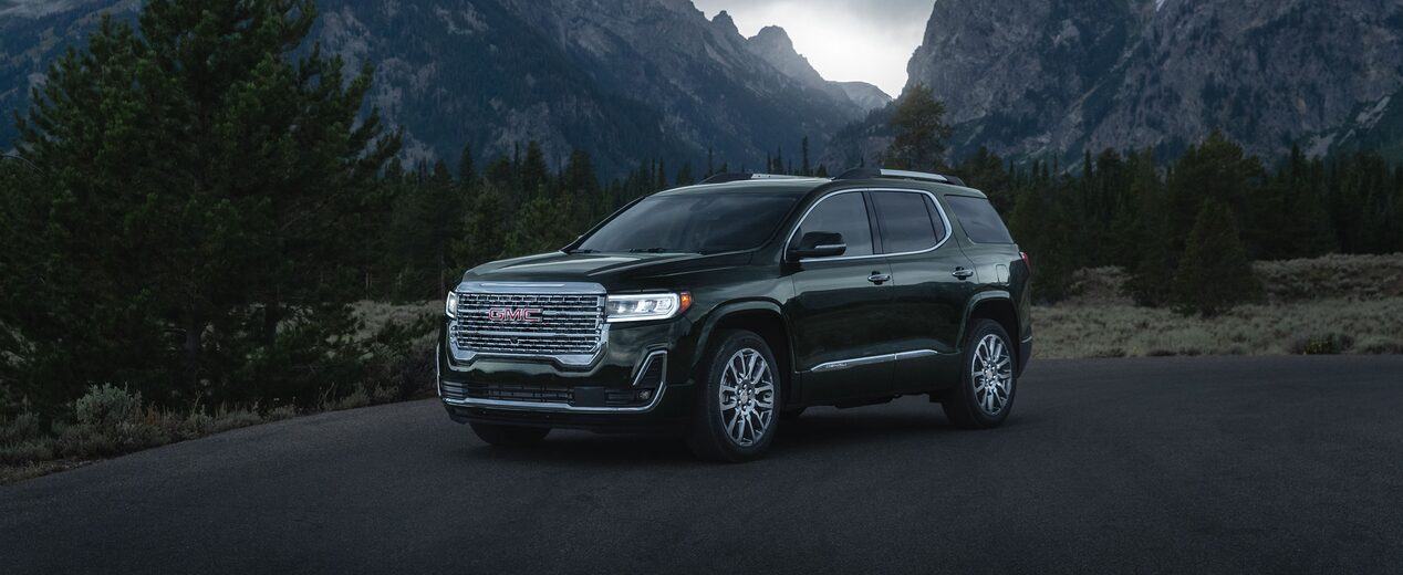 Black GMC SUV Parked On A Mountain Road