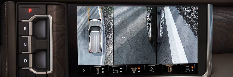 Different Camera Angles in Use on GMC Infotainment Screen Assisting the Driver With Parking the Vehicle