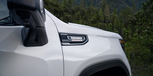 The Summit White GMC Sierra Duramax in the Outdoors