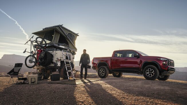 A Man Parks His Canyon AT4X Next to His Pop Up Tent in the Desert