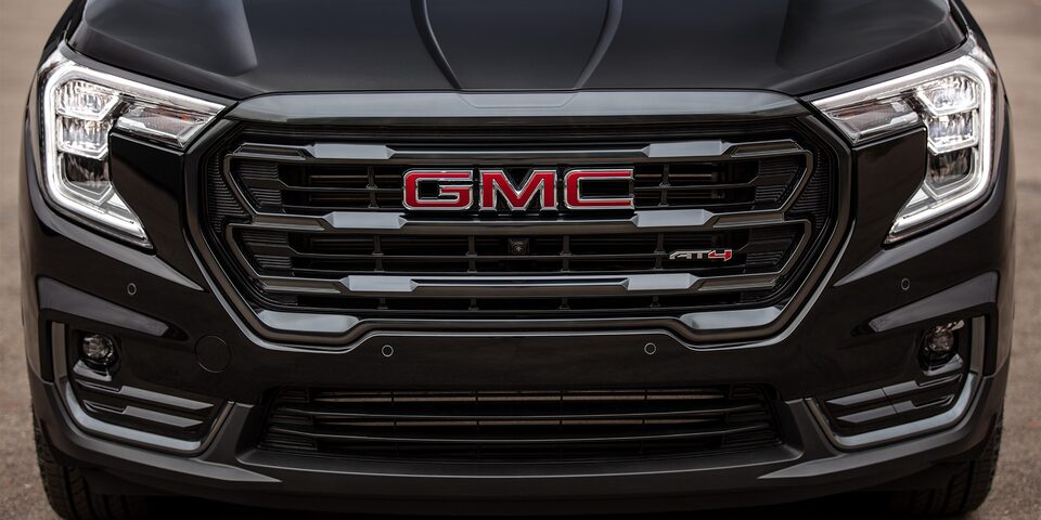 2024 GMC Terrain AT4 showcasing the grille and badging.