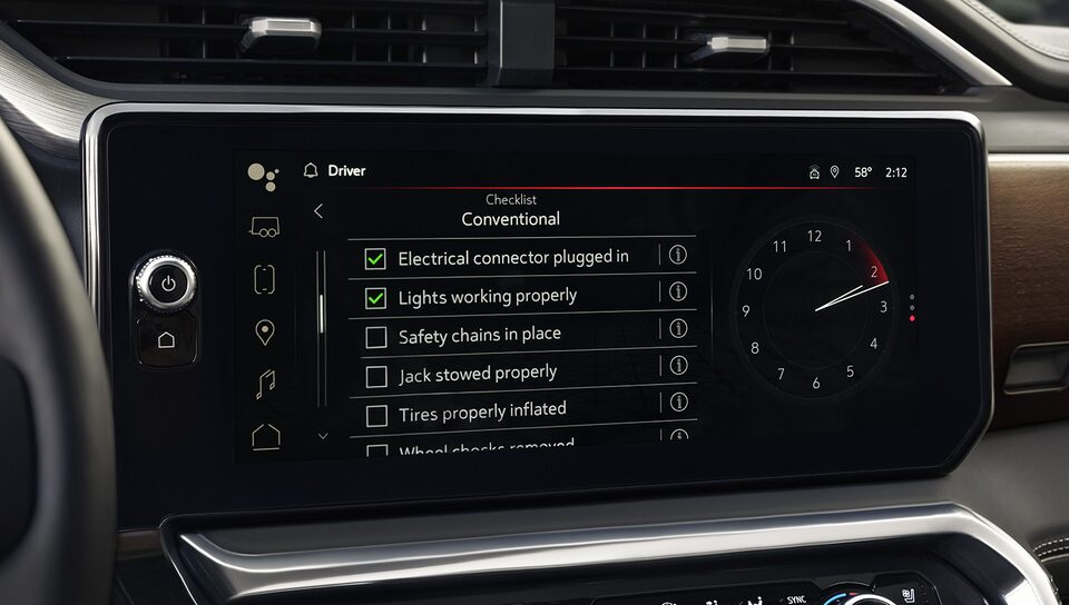 Close-up of the Infotainment System of the 2025 GMC Sierra 1500 Displaying the Available Prograde Trailering System