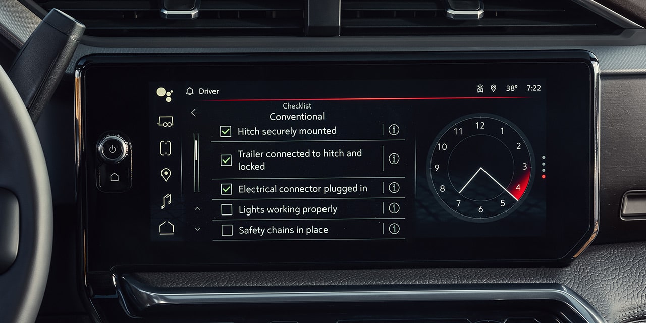 Close-up of the 13.4 Inch Diagonal Premium GMC Infotainment System Displaying Trailer Checklist