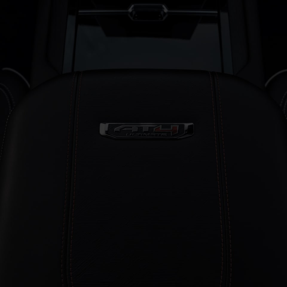 Close up view of the front row storage compartment on the 2025 GMC Yukon.