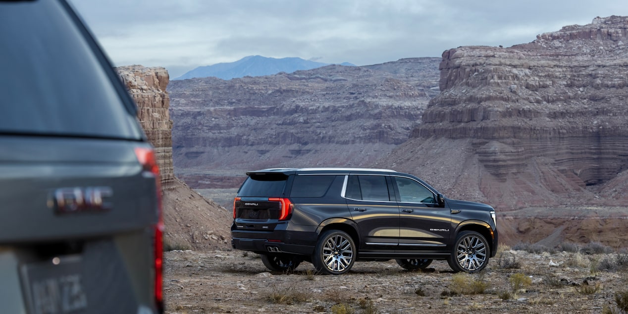 Side view of a 2025 GMC Yukon parked by the cliffs.