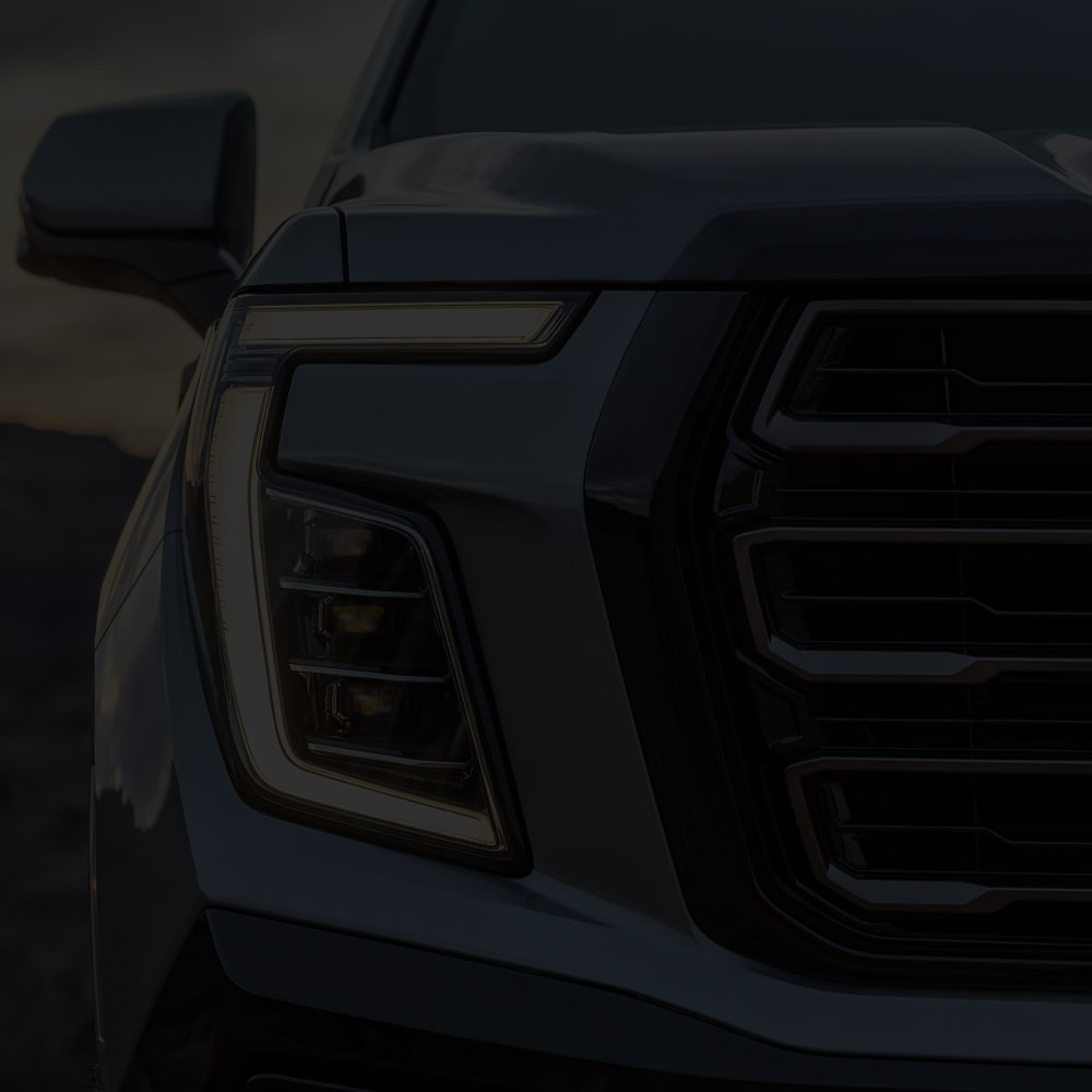 Close up view of the headlamp on the 2025 GMC Yukon.