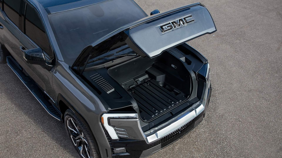 Top view of the 2025 GMC Sierra EV Denali with its front storage open.